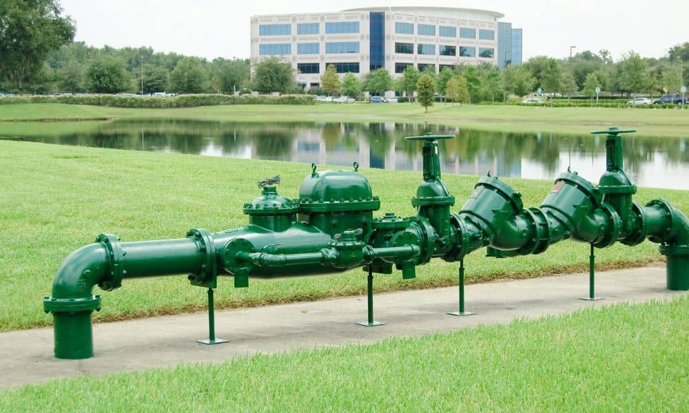 Commercial backflow prevention RPZ style valve assembly protecting municipal water supply